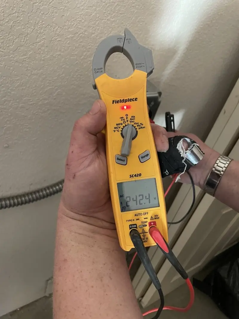 Voltage testing with clamp meter during Circuit Breaker Repair in Holyoke